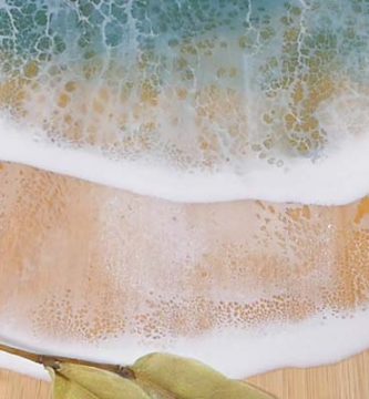 Olas marinas con espuma tabla con resina epoxi epoxica cristal líquido porcelanato gemelos vidrio líquido